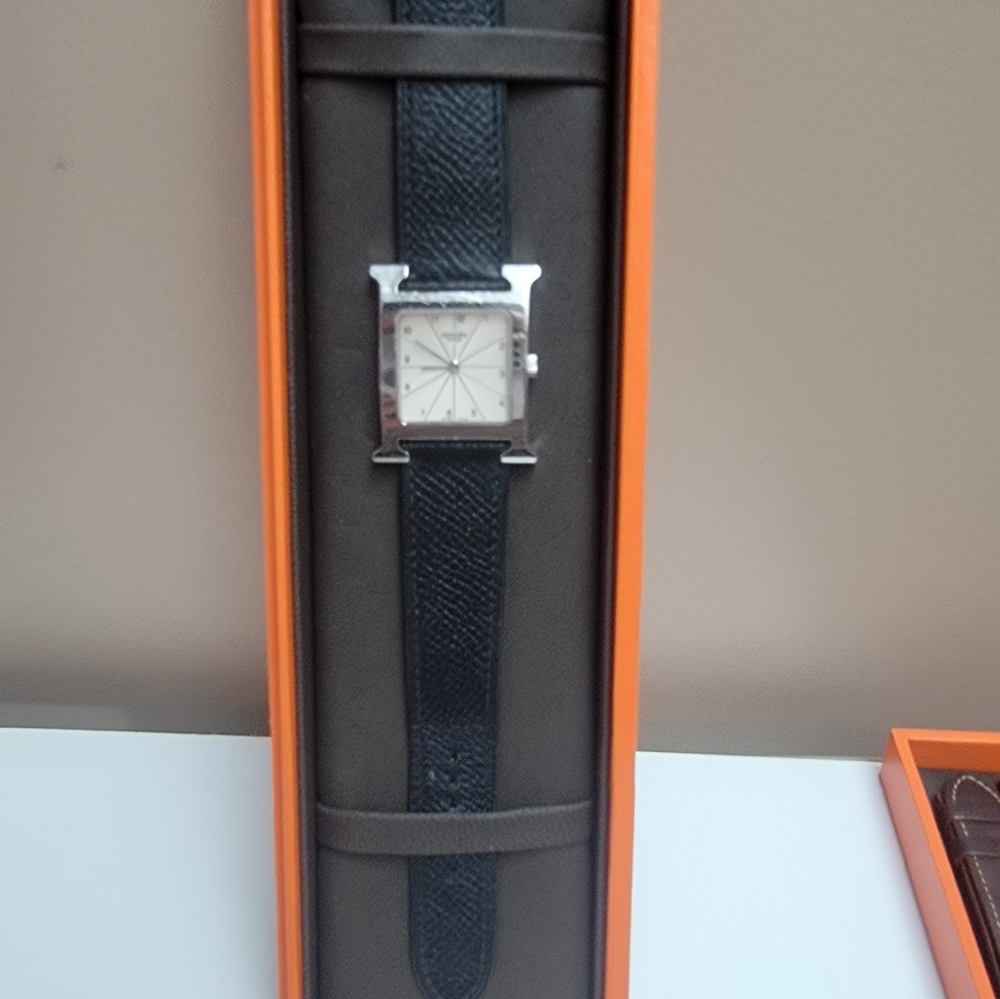 Women's Hermes "H" leather strap watch.